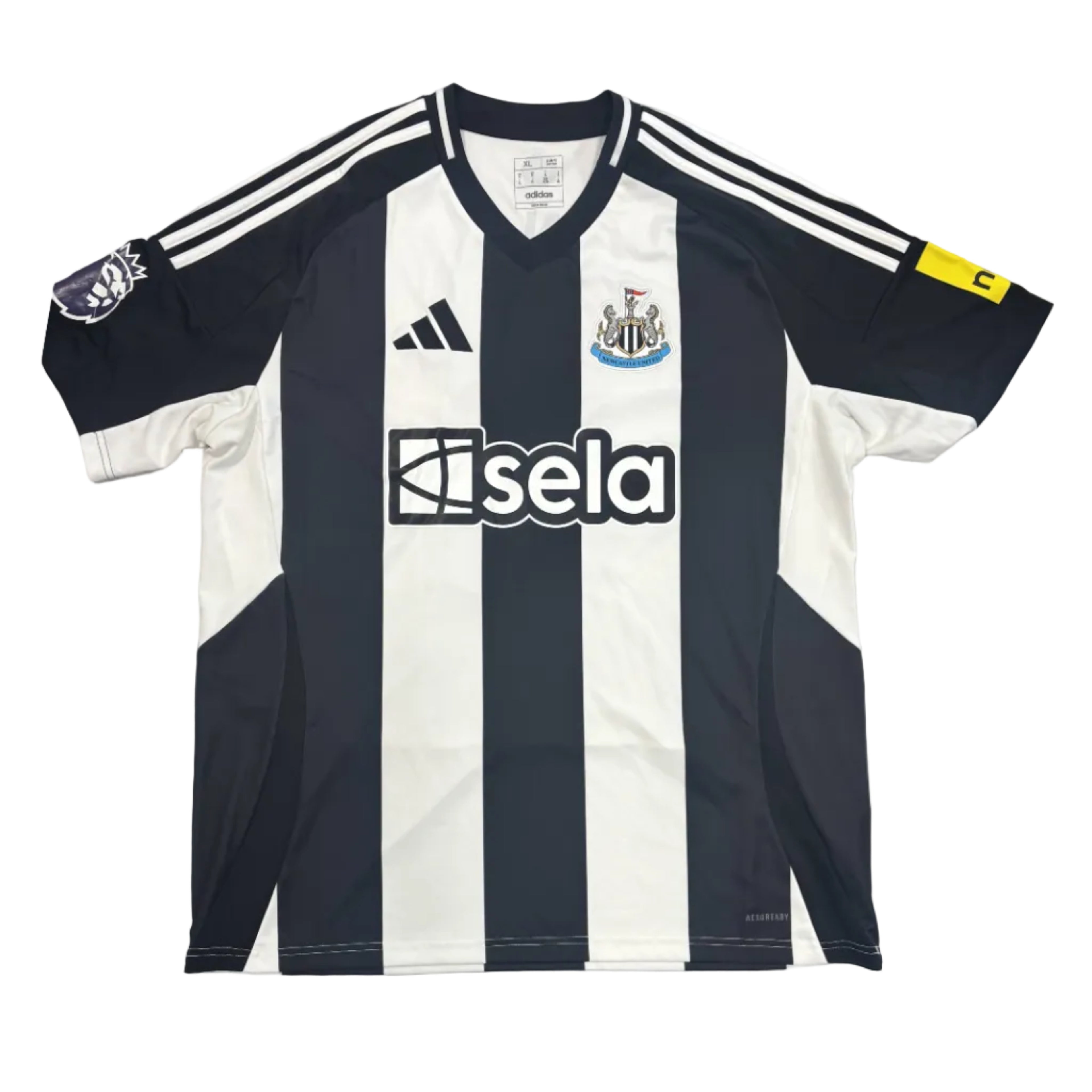 Black and white striped sports jersey with visible branding on a round surface.