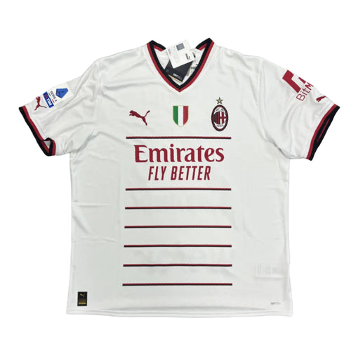 White sports jersey with branding on a round gray surface