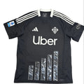Black sports jersey with Uber logo on a round table