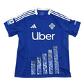Blue sports jersey with Uber logo on a round white table