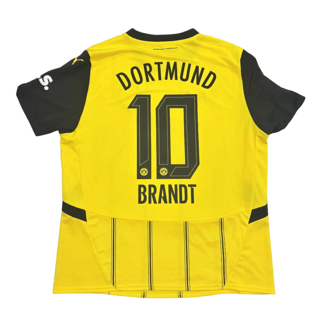 Yellow sports jersey with 'Dortmund' and number '10' on a gray surface