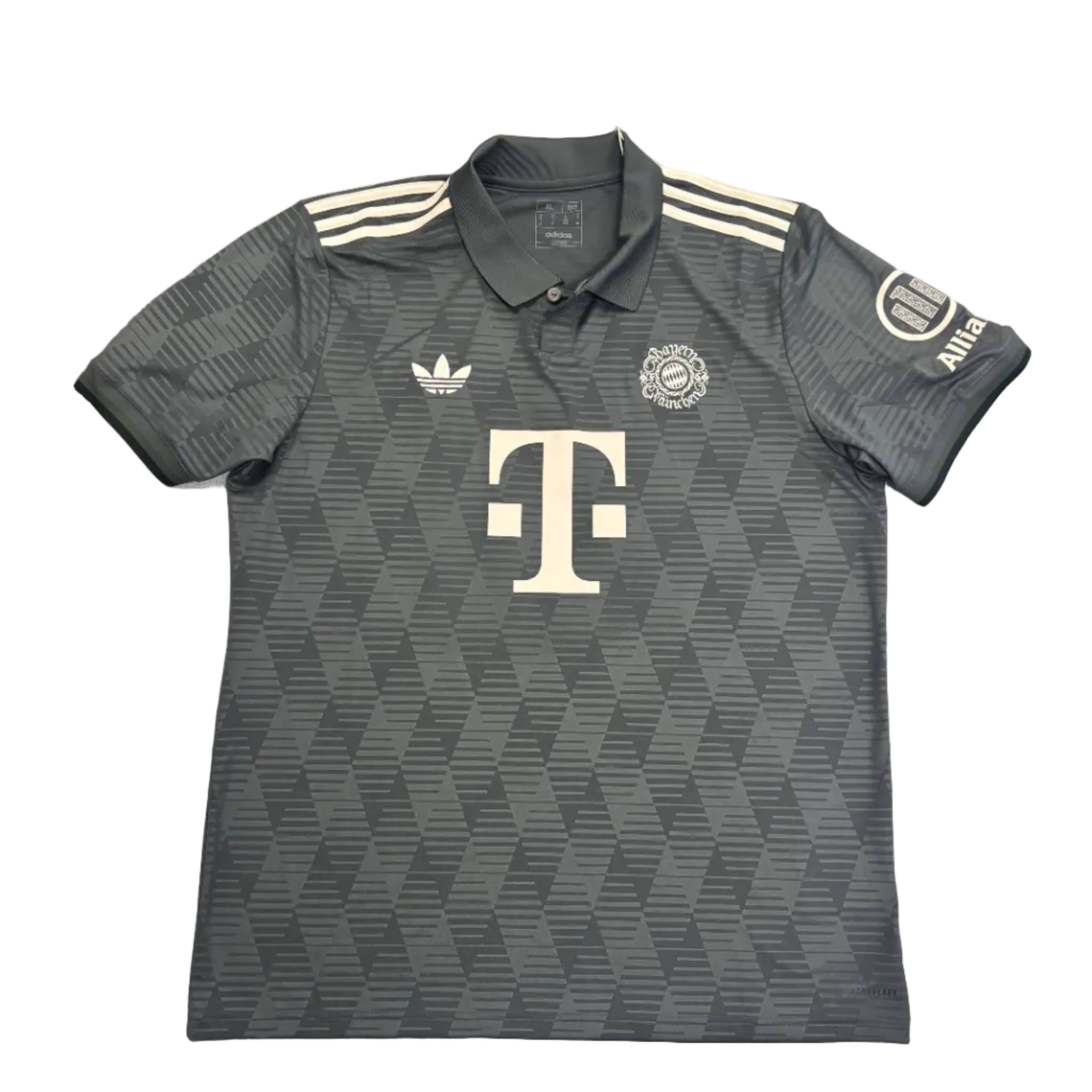 Gray Adidas polo shirt with a logo on a round white table