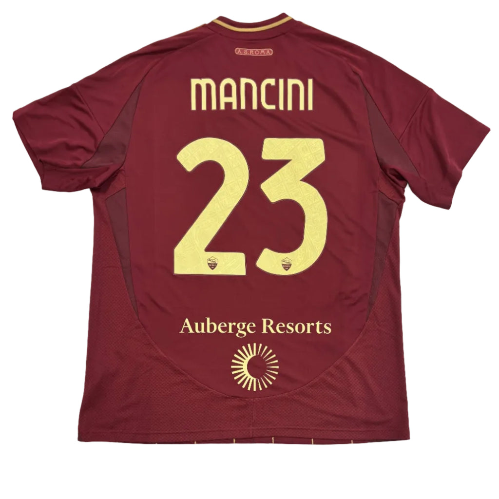 Maroon sports jersey with 'Mancini 23' printed on a white surface