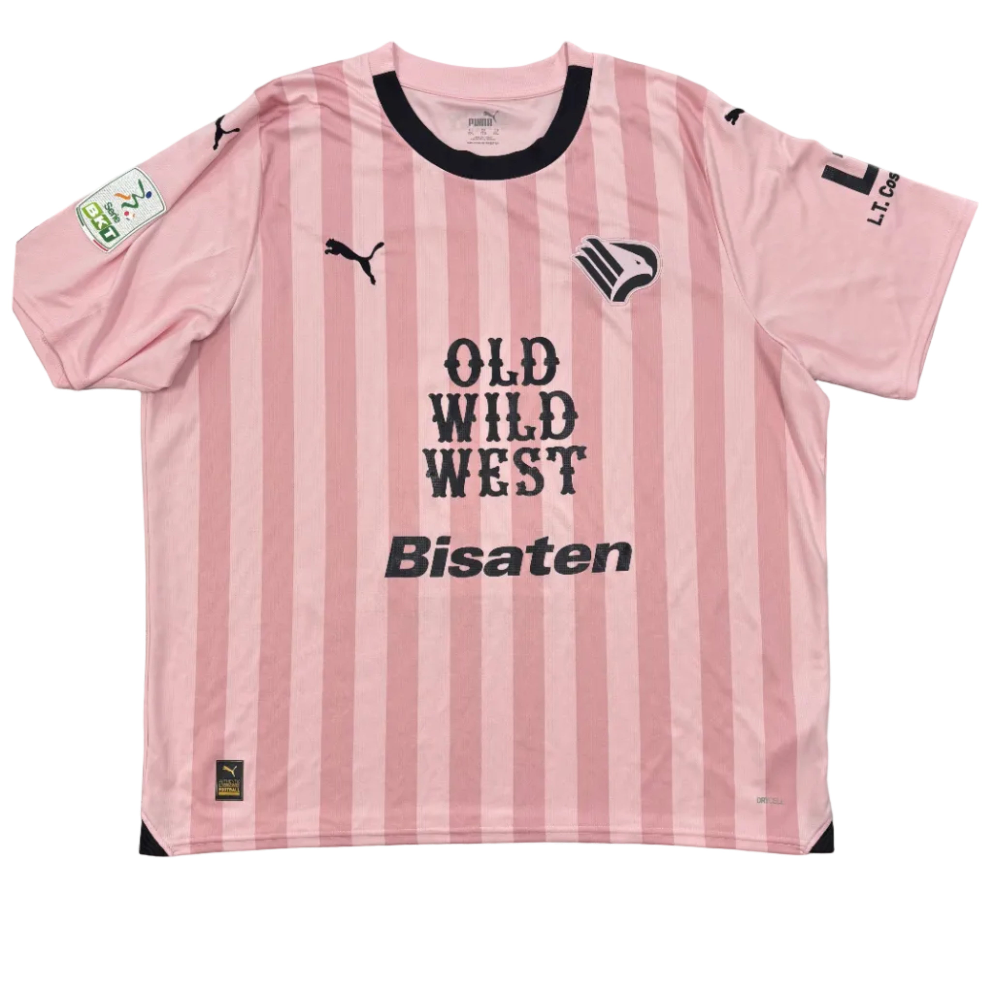 Pink and black striped jersey with text on a gray surface