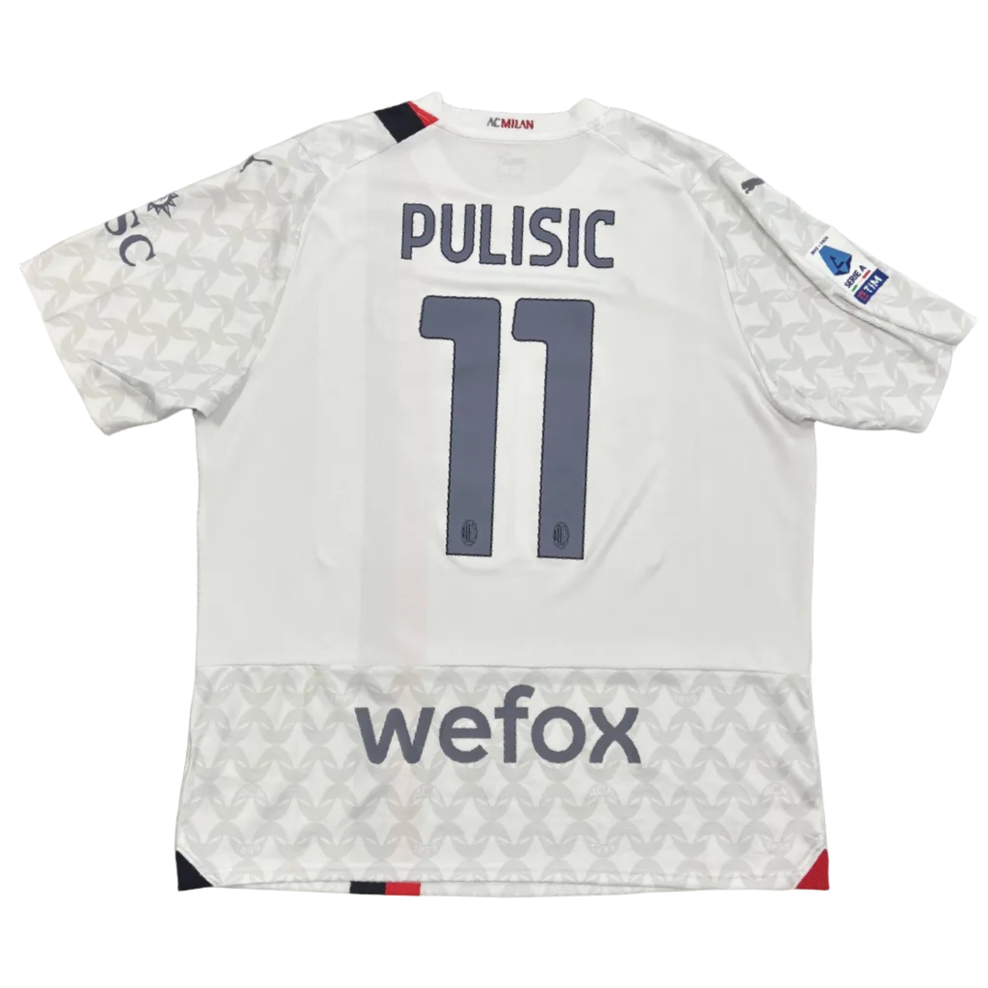 White sports jersey with 'Pulisic' and number '11' on a round table.