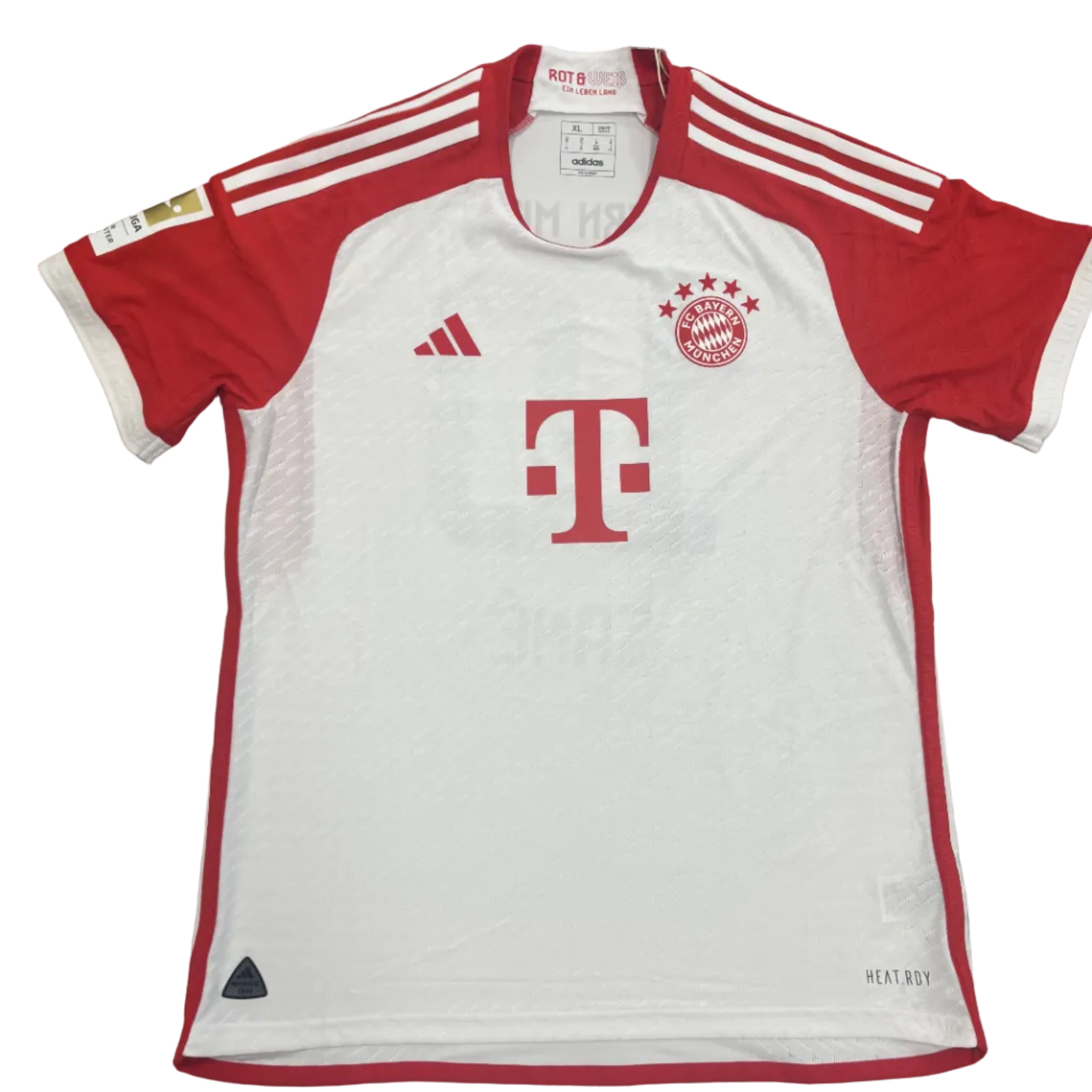 White sports jersey with red accents on a gray surface, featuring Adidas and Bayern Munich logos.