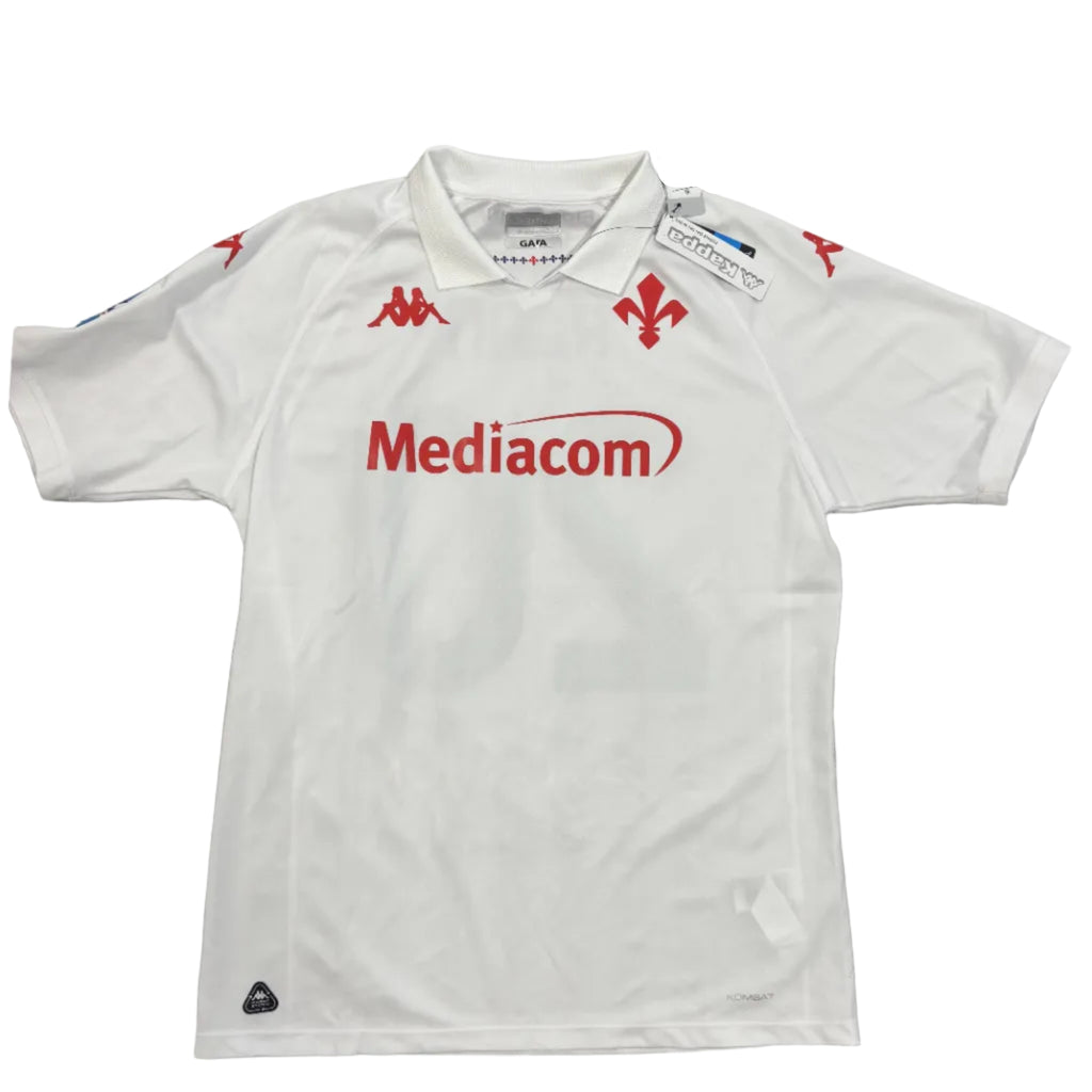 White sports jersey with red 'Mediacom' logo on a gray surface